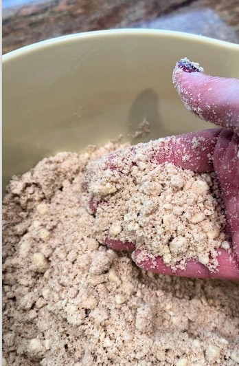 bowl of fresh milled flour with butter for making pie crust