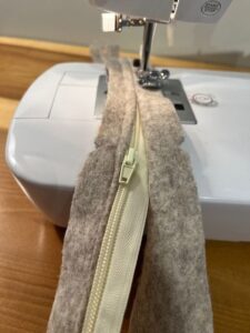 Zipper with wool fabric on sewing machine