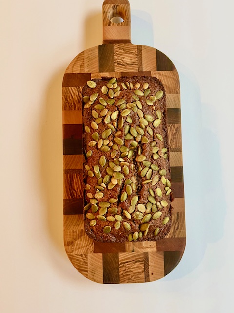 Whole Wheat Pumpkin Bread on a cutting board