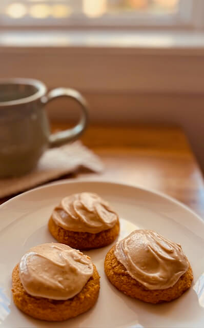 Three Freshly Milled Flour Pumpkin Cookies sitting on a white plate