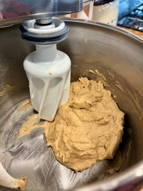dough in mixing bowl for fresh milled english muffins