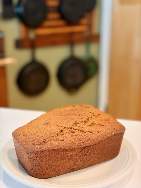fresh milled flour banana bread on white plate