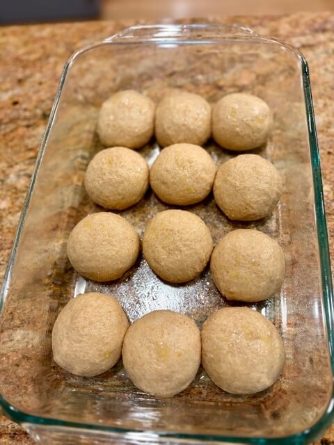12 dinner rolls in a glass 9x13 pan before they rise