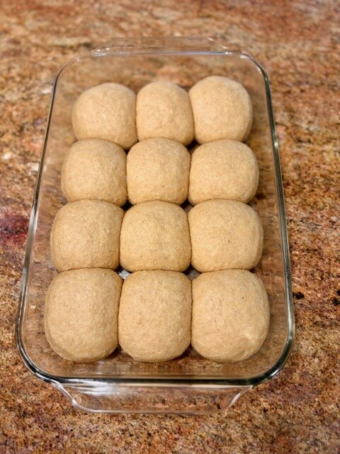 9x13 glass pan of dinner rolls that are fully risen