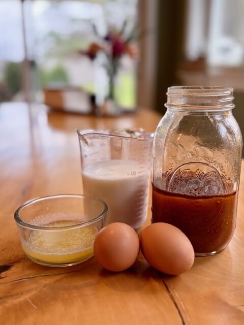 eggs, melted butter, honey and milk for the fresh milled flour dinner rolls