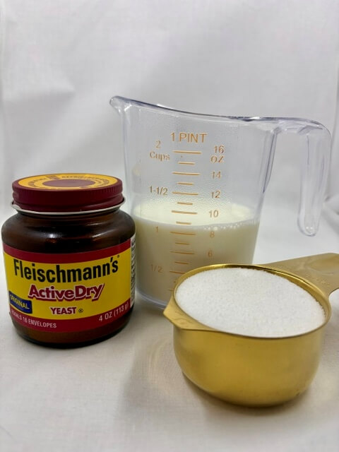 Yeast, Milk and Sugar on a white background