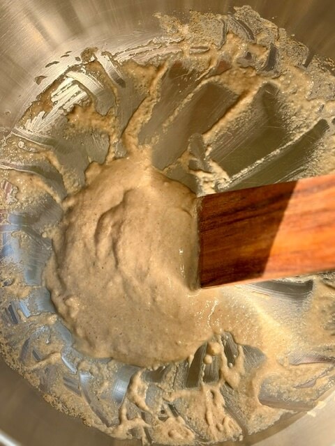 The preferment sponge for Hawaiian rolls with fresh milled flour in a mixer bowl