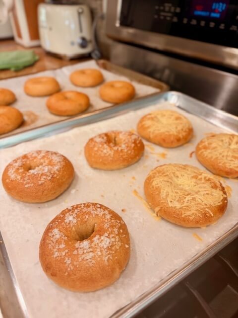 fresh milled flour bagels sitting on the stovetop because just came out of the oven